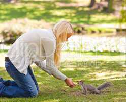 Beautiful woman with a squirrel
