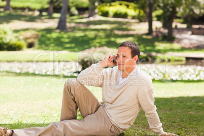 Man phoning in the park