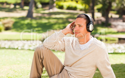 Man listening to music in the park