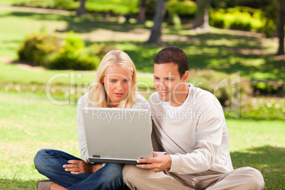 Couple working on their laptop