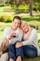 Young couple taking a photo of themselves