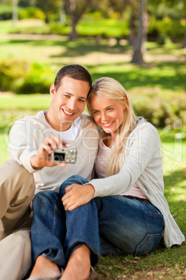 Young couple taking a photo of themselves