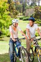 Couple in the park with their bikes