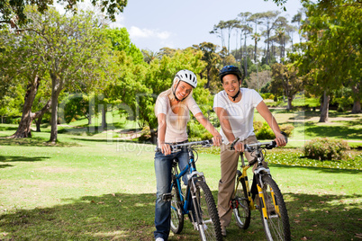 Couple in the park with their bikes