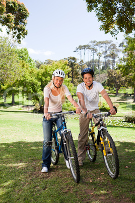 Couple in the park with their bikes