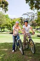 Couple in the park with their bikes