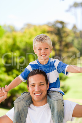 Man giving son a piggyback