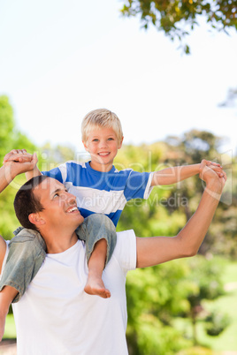 Man giving son a piggyback