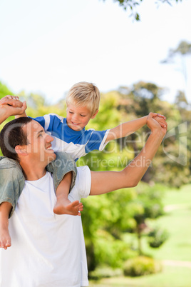 Man giving son a piggyback