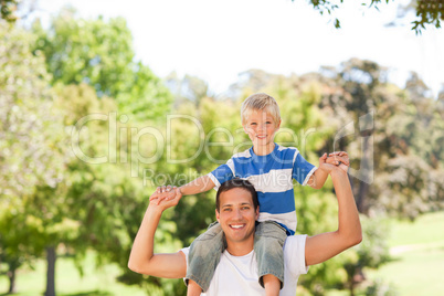 Man giving son a piggyback