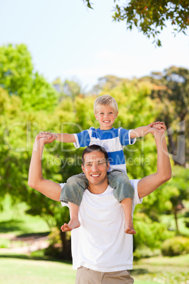 Man giving son a piggyback