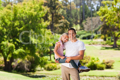Father with her daughter in the park Father with her daughter in the park