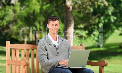 Concentrated man working on his laptop