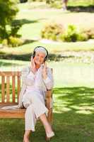 Senior woman listening to some music