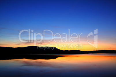 morning lake with mountain before sunrise