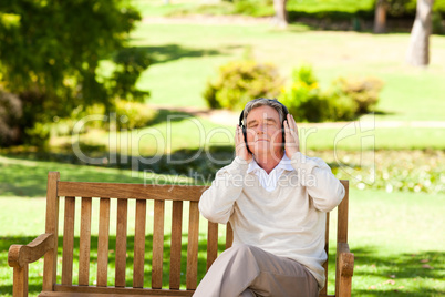 Retired man listening to some music