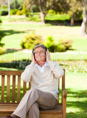 Retired man listening to some music