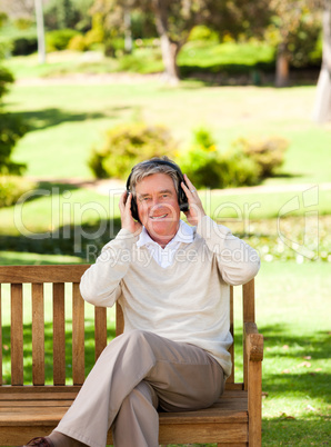 Retired man listening to some music