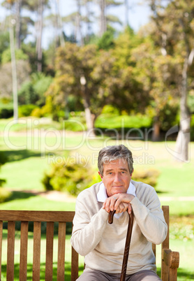 Elderly man with his walking stick