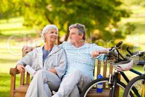 Elderly couple with their bikes