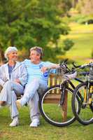 Elderly couple with their bikes