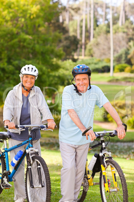 Mature couple with their bikes