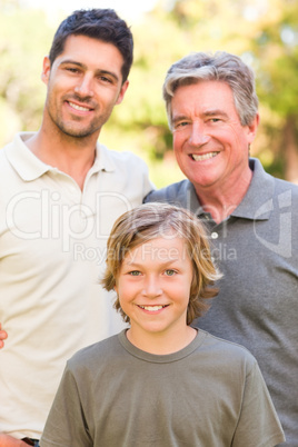 Family looking at the camera in the park