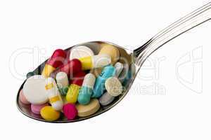 spoon full of tablets