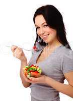 Young attractive woman eats vegetable salad