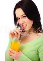 Young attractive woman drinks orange juice