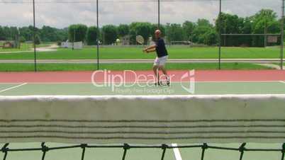 Tennis Player Volleys 04