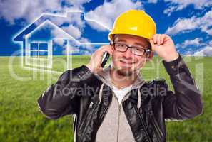 Contractor in Hard Hat in Front of Ghosted House and Grass Field