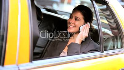 Female in Taxi with Cell Phone