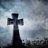 Grunge image of a cross in the cemetery, perfect halloween backg