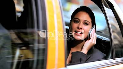 Female in Taxi with Cell Phone