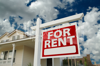 For Rent Real Estate Sign in Front of House