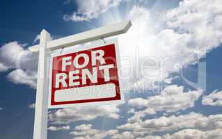 Right Facing For Rent Real Estate Sign Over Sunny Sky