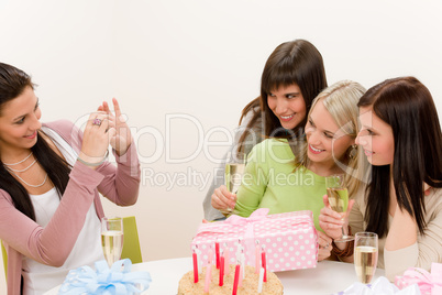 Birthday party - cheerful woman take photo with camera