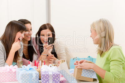 Birthday party - cheerful woman take photo