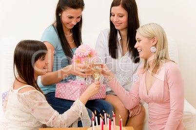 Birthday party - woman getting present and flower