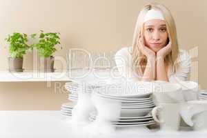 Modern kitchen - frustrated woman in kitchen