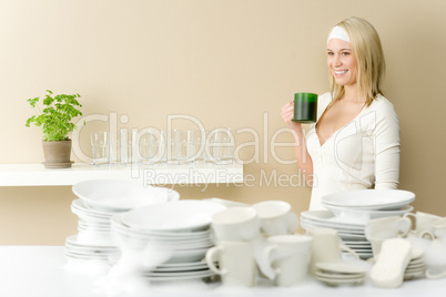 Modern kitchen - happy woman  having coffee break