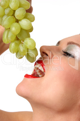 in Weintraube beissen