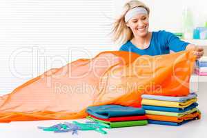 Laundry - woman folding clothes