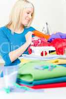 Laundry - woman folding clothes home