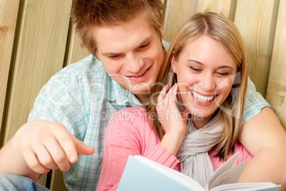 Couple in love - summer portrait with book