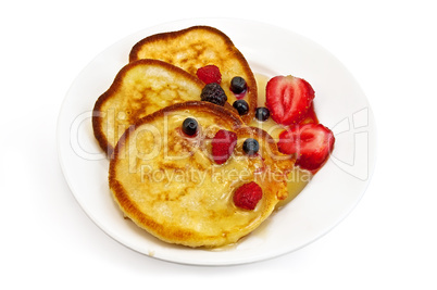 Three pancakes with berries