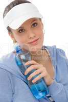 Sport - young woman fitness outfit water bottle