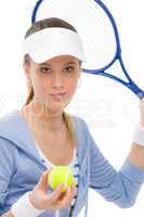 Tennis player - young woman holding racket