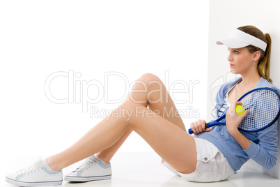 Tennis player - young woman holding racket